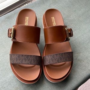 Brand new never worn Michael Kors Sandals.